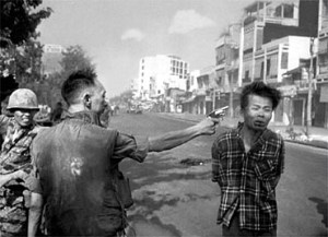 RETRANSMISSION TO RESIZE FILE--FILE--South Vietnamese National Police Chief Brig Gen. Nguyen Ngoc Loan executes a Viet Cong prisoner with a single pistol shot in the head in Saigon Feb. 1, 1968. Nguyen died Wednesday, July 15, 1998  at his home in Burke, a suburb of Washington, D.C., after a battle with cancer, said his daughter, Nguyen Anh. He was 67. This photo of Nguyen aiming a pistol point-blank at the grimacing prisoner's head became a memorable image of the Vietnam War. The photograph, by Eddie Adams, won a Pulitzer prize for The Associated Press. (AP Photo/Eddie Adams)