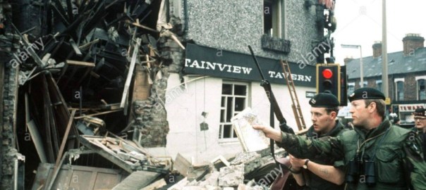IRA bomb blast wrecks the Mountainview Tavern in Belfast 
Soldiers view the destruction caused by the blast