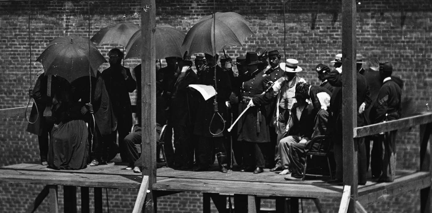 Close-up: the death warrant for the four is being read aloud by General John F. Hartranft.