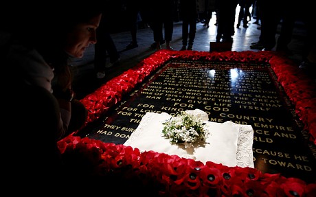 The bridal bouquet rests on the grave